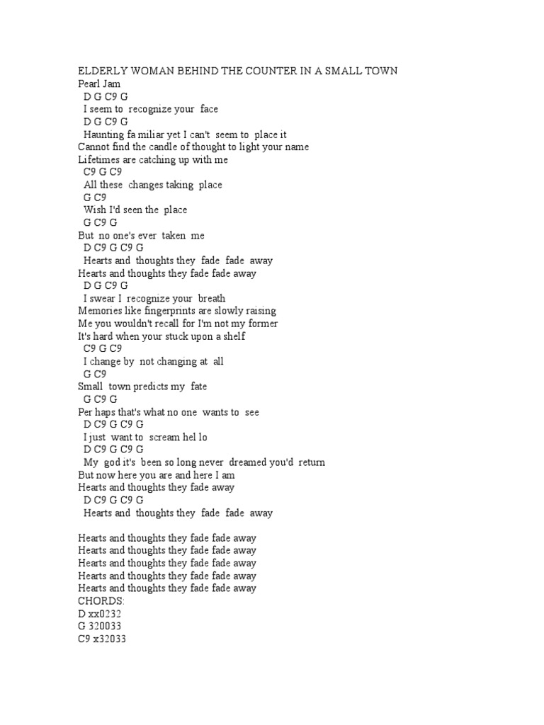 Elderly Woman Behind The Counter In A Small Town