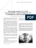Interesting Eruption of 4 Teeth Associated With A Large Dentigerous Cyst in Mandible by Only Marsupialization