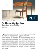 An Elegant Writing Desk: A Three-Drawer Case On Fluted Legs