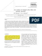 A Dynamic Stiffness Analysis of Damped Tubes Filled With Granular Materials