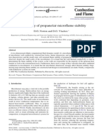 CFD Study of Propane/Air Microflame Stability and Effects of Wall Conductivity