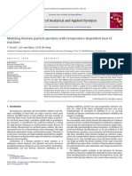 Modeling Biomass Particle Pyrolysis With Temperature-Dependent Heat of Reactions