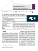 On The Performance of A Vertical Helical Coil Heat Exchanger. Numerical Model and Experimental Validation