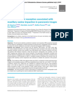 Predictors of Root Resorption Associated With Maxillary Canine Impaction in Panoramic Images