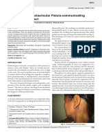 A Rare Case of Postauricular Fistula Communicating With The Parotid Duct