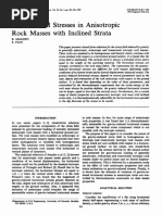 Gravitational Stresses in Anisotropic Rock Masses With Inclined Strata