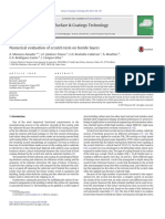 Numerical evaluation of scratch test on boride layers