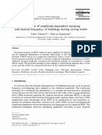 Evaluation of Amplitude-Dependent Damping and Natural Frequency of Buildings During Strong Winds