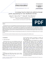 Optimal Pipe Replacement Strategy Based On Break Rate Prediction Through Genetic Programming For Water Distribution Network