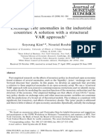 Exchange Rate Anomalies in The Industrial Countries: A Solution With A Structural VAR Approach