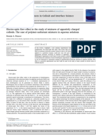 EO Kerr Effect in Oppositely Charged Colloids