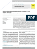 Characterization of Atomization and Combustion in Moderately Dense Turbulent Spray Flames