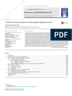 A Review of Water Transport in Dense-Graded Asphalt Mixtures