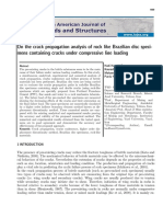 On The Crack Propagation Analysis of Rock Like Brazilian Disc Specimens Containing Cracks Under Compressive Line Loading