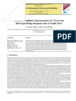 On The Probabilistic Characteristics of A Two Lane Slab-Type-Bridge Response Due To Traffic Flow