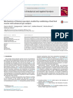 Mechanisms of biomass pyrolysis studied by combining a fixed bed reactor with advanced gas analysis