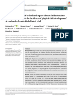 Does The Time-Point of Orthodontic Space Closure Initiation After Tooth Extraction Affect The Incidence of Gingival Cleft Development? A Randomized Controlled Clinical Trial