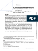 Predictors of Postretention Stability of Mandibular Dental Arch Dimensions in Patients Treated With A Lip Bumper During Mixed Dentition Followed by Fixed Appliances