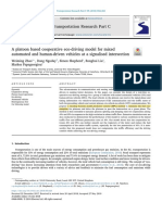 A Platoon Based Cooperative Eco-Driving Model For Mixed Automated and Human-Driven Vehicles at A Signalised Intersection