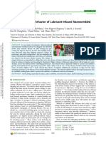 Marine Antifouling Behavior of Lubricant-Infused Nanowrinkled Polymeric Surfaces