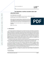 Interaction Between A Surface Acoustic Wave and Adsorbed Atoms