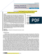 A Parametric Study On The Centrifugal Force-Induced Stress and Displacements in Power-Law Graded Hyperbolic Discs