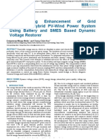 Voltage Sag Enhancement of Grid Connected Hybrid PV-Wind Power System Using Battery and SMES Based Dynamic Voltage Restorer