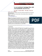 7-Cell Hollow-Core Photonic Bandgap Fiber With Broad Spectral Bandwidth and Low Loss