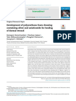 Development of Polyurethane Foam Dressing Containing Silver and Asiaticoside For Healing of Dermal Wound