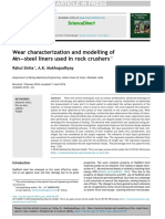 Wear Characterization and Modelling of MN Steel Liners Used in Rock Crushers