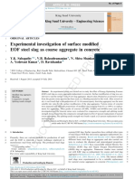 Experimental investigation of surface modified EOF steel slag as coarse aggregate in concrete