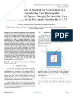 Numerical Study of Natural Air Convection in A Domain Bounded by Two Rectangular Parallelepipeds of Square Straight Sections For Ra 106 For A Value of The Hartmann Number Ha 0.75