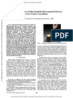 Design and Control of Fully Handheld Microsurgical Robot For Active Tremor Cancellation