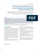 Theoretical and Experimental Analysis of The Cracking Moment in Reinforced Concrete Footing Supported in Granular Soil