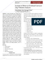 Bearing Life Enhancement of Motor in Overhead Conveyor Using Vibration Analysis