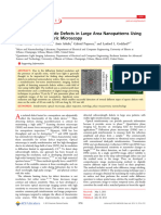 Detecting 20 NM Wide Defects in Large Area Nanopatterns Using Optical Interferometric Micros