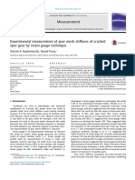 Experimental Measurement of Gear Mesh Stiffness of Cracked Spur Gear by Strain Gauge Technique