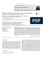 Effects of Microstructural Constraints On The Transport of Fission Products in Uranium Dioxide at Low Burnups