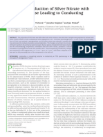 Solid-State Reduction of Silver Nitrate With Polyaniline Base Leading To Conducting Materials