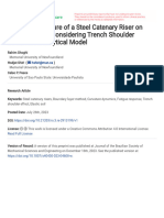 Dynamic Curvature of A Steel Catenary Riser On Elastic Seabed Considering Trench Shoulder Effects: An Analytical Model