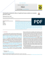 Assessing_the_asymmetric_effects_of_capital_and_mo