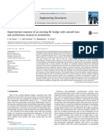 Experimental Response of an Existing RC Bridge With Smooth Bars and Preliminary Numerical Simulations