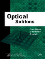 Optical Solitons: From Fibers to Photonic Crystals