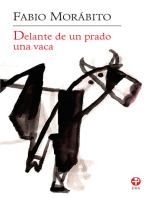 Delante de un prado una vaca