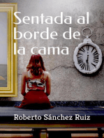 Sentada al borde de la cama